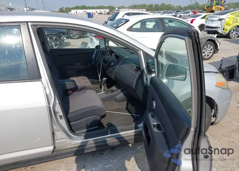 2009 Nissan Versa 1.8Sl z USA, uszkodzony, nr VIN 3N1BC13E49L357004